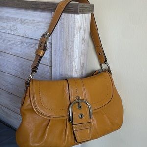 Woman’s purse coach